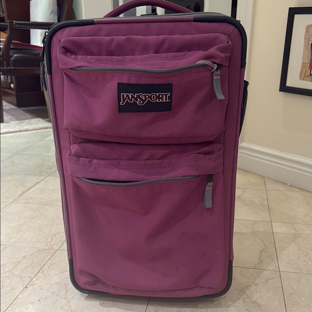 JanSport Magenta Carry-On Spinner Luggage